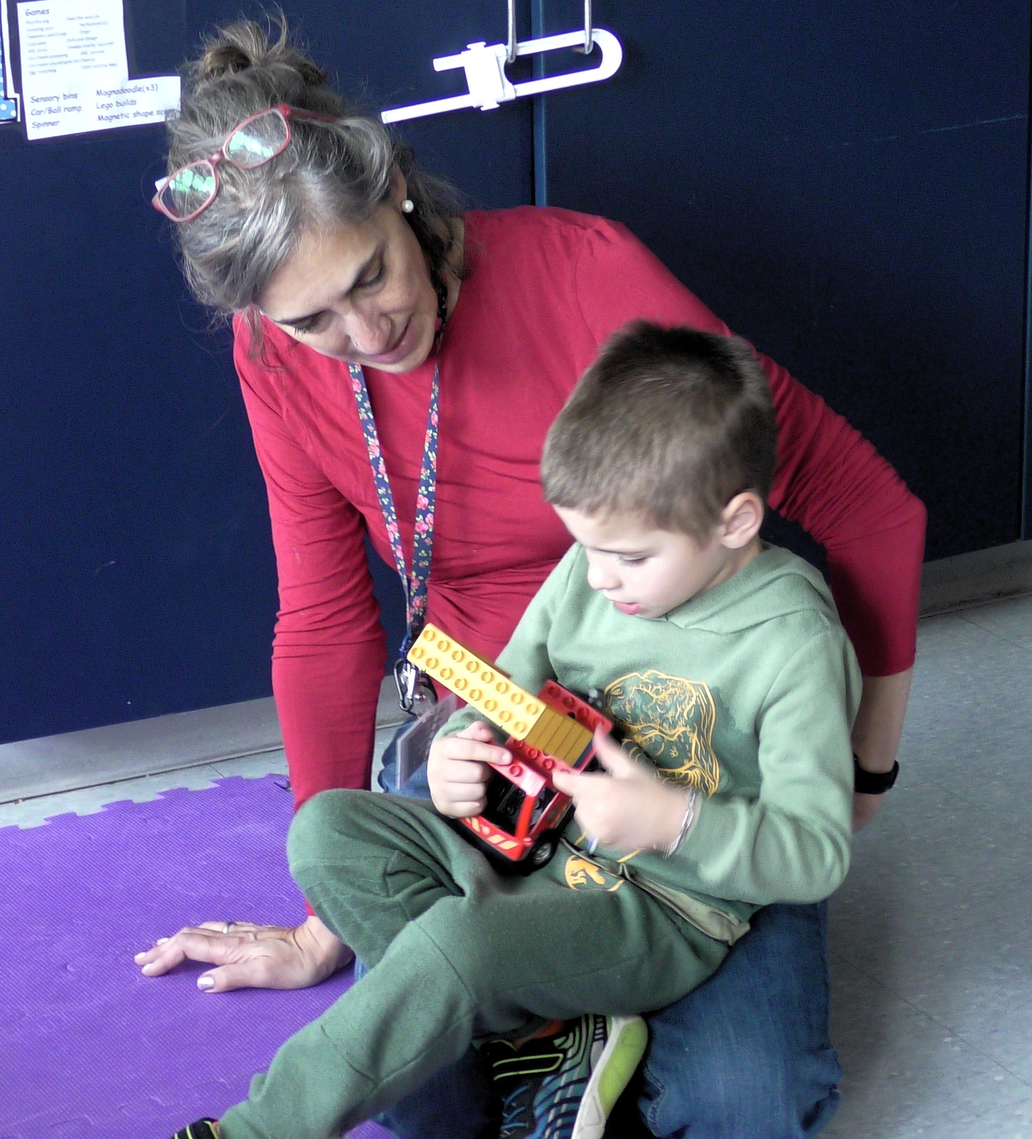 EC teacher with a kid